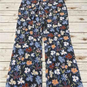 Blue and Red Jeans with Bold Floral Design